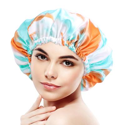 China Regular Size Double Layer Tie Dye Satin Shower Caps EVA Waterproof Reusable Shower Caps For Long Hair for sale