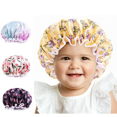 China Acceptable Wholesale Double Layer Logo Kids Shower Reusable Waterproof Baby Shower Hats Satin Floral Hood Baby Shower Hat for sale