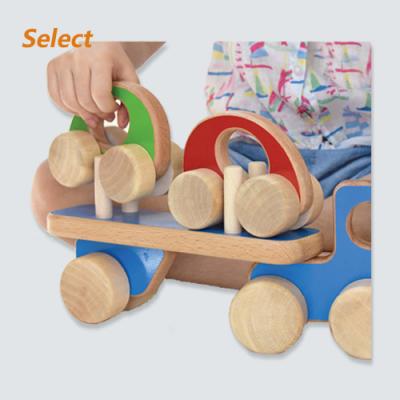 China 2021 New Eco-friendly Material ider Baby Wooden Push Toys Car Stacked Wooden Transporter for sale