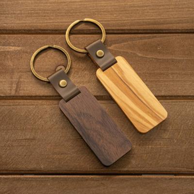 China Wholesale Custom Engraved Wooden Keyring Favorable Prices Sublimaiton Wooden Key Chain With Name for sale