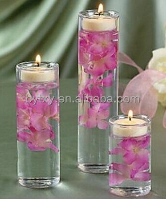 China Handcrafted romantic clear cylinder glass candle holders with flower decor for sale