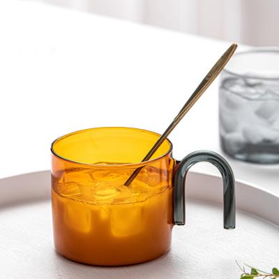 China Sustainable 300ml Unique Reusable Colorful Glass Drink Cup Dessert Cup With U Shape Handle for sale