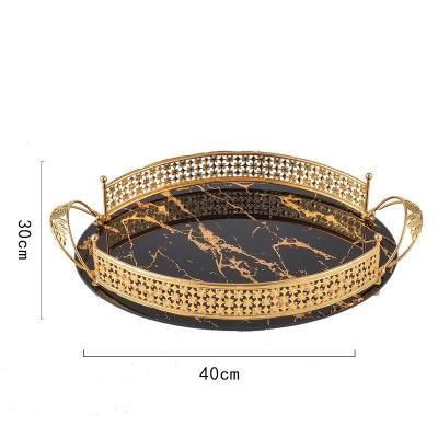 China Sustainable Tempered Glass Nordic Marbled Metal Hollowed- Out Amphora Cosmetics Tray for sale