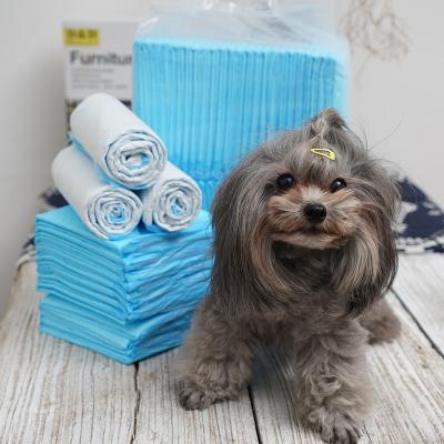 China Wholesale Super Absorbent Stocked Pet Pee Absorption Pad Puppy Training Toilet Bit Pads Disposable Dog Pad for sale