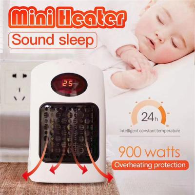 China 2022 Home and Office Heater Hot Style Mini Portable Heater With Wall Mounted For Car Christmas Gift Wonder Electric Fan for sale