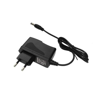 China PC+ABS Universal Wholesale 12V 1A DC Adapter 12W Wall Mount Charger 5.5*2.1mm 5.5*2.5mm Tips Transformer Adapter for sale