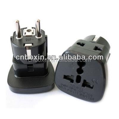 China Christmas Gift Commercial US/AU/EURO/UK Plug Socket Adapter With Dual Plug Outlet Travel Adapter for sale