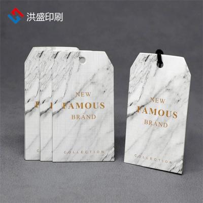 China Sustainable Wholesale Fashion Custom Printing Unique Garment Hangtag For Clothing for sale