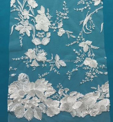 China Newest Beautiful Flower Sustainable Embroidery Polyester French Lace Fabric for sale