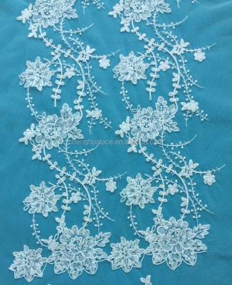 China Last Sustainable Design Ivory Wedding Tying Lace Fabric For Wedding Dresses for sale