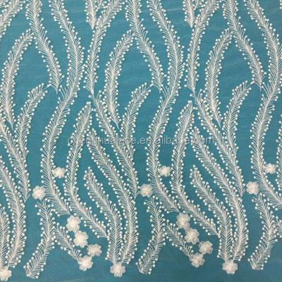 China Latest Sustainable Design Ivory Wedding Lace Fabric For Wedding Dresses for sale