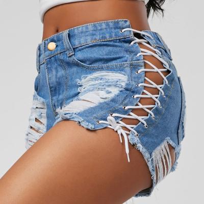 China Autumn Breathable Lattice Fashion Hot Selling Beaded Vintage Pleated Scratch Ripped Women Denim Shorts Side Bandage Hot Pants for sale