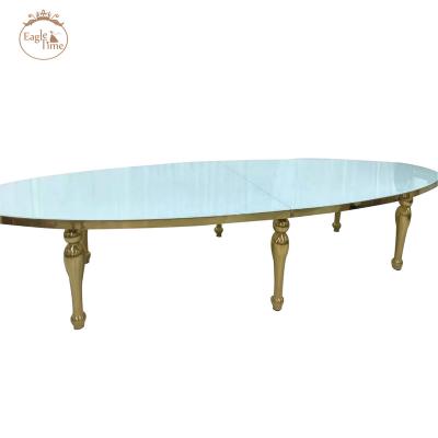 China Gold Stainless Steel Event Furniture Wedding Banquet Modern Oval Hotel Lobby Dining Table for sale