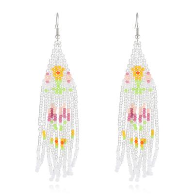 China Bohemian Handmade Summer Bohemia Fresh Flower Rice Pearl Tassel Colorful Tassel Earrings Long Earrings For Women for sale