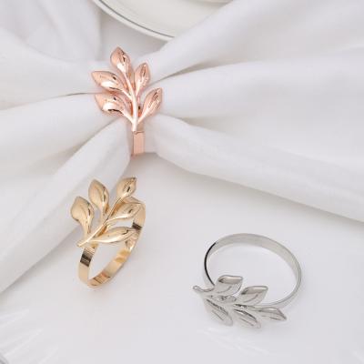 China Western Design Restaurant Napkin Buckle Paper Napkin Ring Alloy Maple Leaf Napkin Ring Wholesale FASHIONABLE Metal Small Leaves for sale