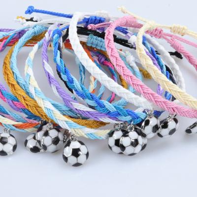 China Vintage Niche Design Unisex Wax Wire Braided Bracelet Variety Wholesale Enamel Drop Oil Football Pendant Couple Bracelet for sale