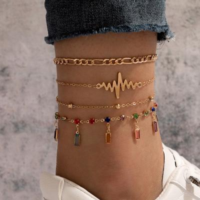 China Luxury BOHEMIA Color Rhinestone Tassel Bracelet Bohemian Ladies Set Metal Heartbeat Chain Anklet for sale