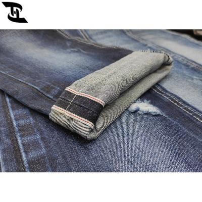 China Stocklot Shrink-Resistant Low Price 14 Oz Denim Fabric With Red Edge 100 Cotton Denim YHT6278L for sale