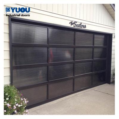 China China Industrial Factory Glass Garage Doors With Pedestrian Door for sale