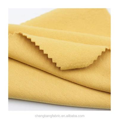 Cina Anti-Static Heavyweight 330gsm Cotton Spandex Brushed Single Fabric Kid's Jersey Footer Fleece Fabric in vendita