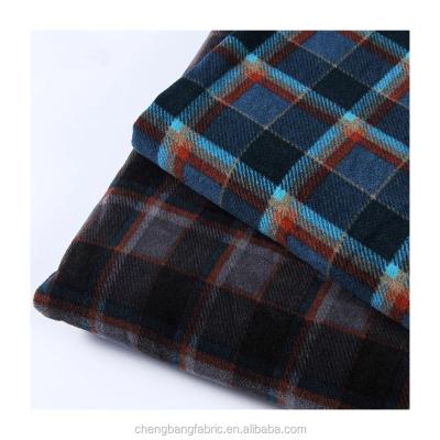 China Anti-Static 100% Polyester Double Side Brushed Plaid Patchwork Pattern Printing Fleece Fabric For Sweater for sale