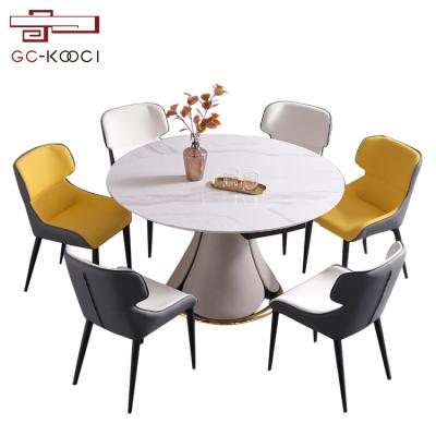 China Modern White Marble Round Extendable Dining Table Chipboard Stone Dining Tables for sale