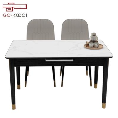 China Convertible Luxury Kitchen Rectangular Extendable White Dining Table Chipboard Stone Dining Tables for sale