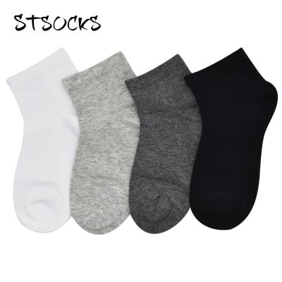 China New Arrival Wholesale High Quality Antibacterial Boys Solid Color Smell Resistant Stretch Kids School Crew Socks for sale