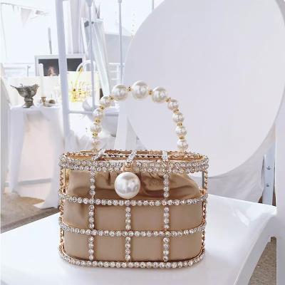 China 2022 hot selling PU women bead handbags wedding crystal ladies metal case ladies beaded luxury handbag women mini purses for sale