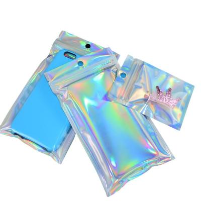 China Holographic Zipper Color Barrier Laser Zipper One Side Clear Resealable Mylar Foil Plastic Bag With Own Logo for sale