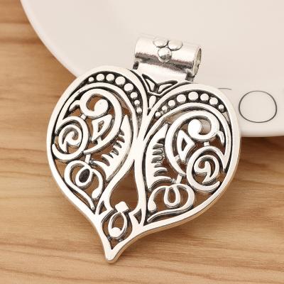 China TRENDY Tibetan Silver Hollow Boho Big Heart Shape Charms Pendants For Necklace Jewelry Making Accessories for sale