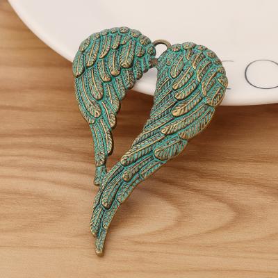 China FASHIONABLE Verdigris Patina Large Angel Wings Feather Charms Pendants for Necklace Jewelry Making Accessories for sale