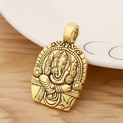 China FASHIONABLE Gold Tone Ganesha Elephant God Charms Tibetan Pendants For Necklace Jewelry Making Findings 38x24mm for sale