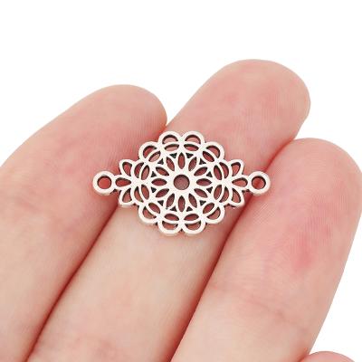 China Popular Tibetan Silver Hollow Flower Charm Connector For Bracelet Jewelry Making Accessories 25x15mm for sale