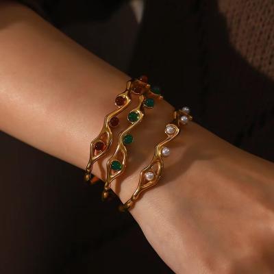 China Vintage / Sporty Texture Series Casual Green Red Natural Stone Bead Embellished Opening Without Fading Titanium Steel Bracelet for sale