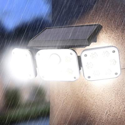 China Modern Warehouse 74led 3 Head Wall Light Outdoor Garden Solar Powered Wall Light Black for sale