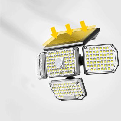 China 4head garden luz 180 led outdoor led fence solar wall light flood light cob patio lamps for sale