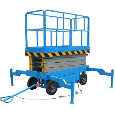 China Garment Shops Factory Towable Mobile Scissor Lift 1000kg 6m for sale