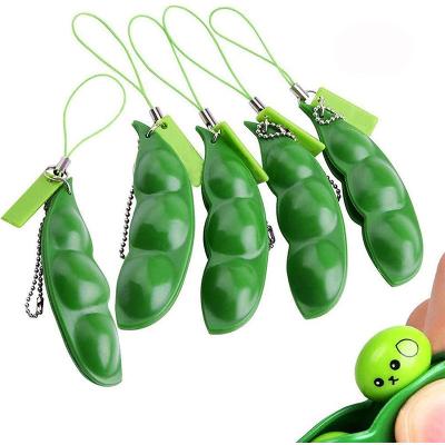 China Squeezable Squeezable Bean Toy Soft Silicone Decompression Pea Pod Keychain Anti Lost Squeezed Bean for sale