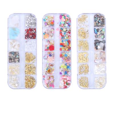 China Nail Art Decoration 12 Grid Fashion Nail Decoration Set Glass Diamond Lovely Animals Rivet Bead Special Shaped Rhinestones Nail for sale