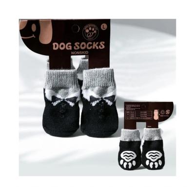 Chine Imprimé en noir tricoté Pet Cartoon mignon chaussettes pour chiens 1000 quantité à vendre