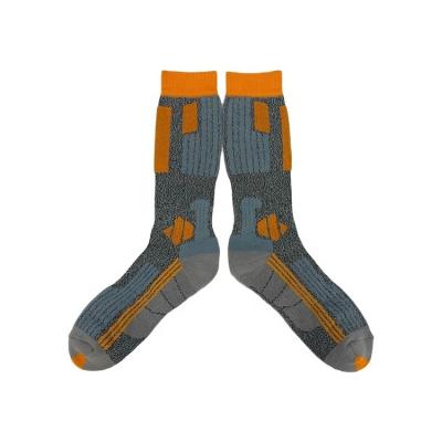 Chine Des chaussettes de sport longues et respirantes pour hommes des chaussettes de sport anti-déroute épaisses en orange à vendre