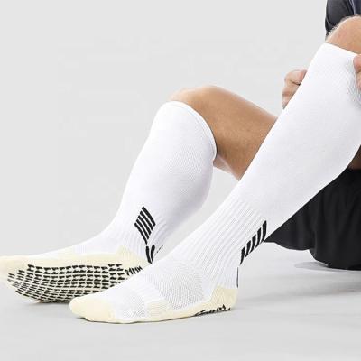 China Non Slip Sport Football Sports Grip Socks Anti Slip Tube Socks for Men for sale