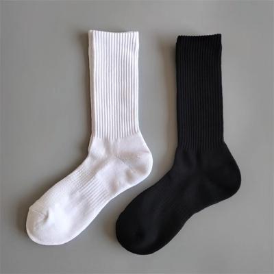 China Calcetines deportivos de algodón unisex, antiderrapante, agarre de la tripulación con algodón peinado al 85%, poliéster al 10% en venta