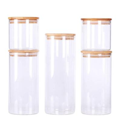 China 3oz 6oz 16oz Clear Glass Kitchen Spice Container Viable Food Storage Glass Jar With Wooden Cork Lid for sale