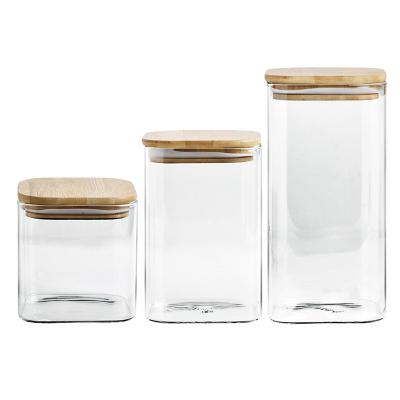 China Storage Kitchenware Wholesale Storage Bottles And Jars Clear Spice Storage Glass Jar With Bamboo Lids for sale