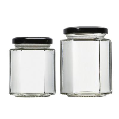 China Storage sells kitchenware storage jars and wholesales food storage transparent glass bottle bottle with tinplate lid for sale