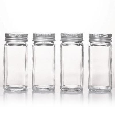 China Storage sells kitchenware storage jars and wholesales clear glass spice storage bottle bottle with aluminum lid for sale