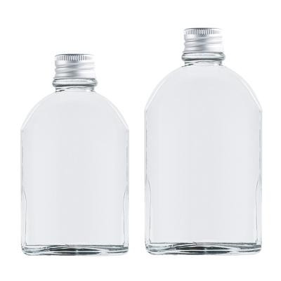 China Storage Wholesales Customize Glass Jars Kitchenware Transparent Glass Drinking Bottle With Lid for sale