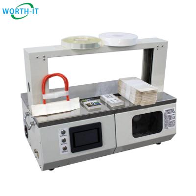 China Food Paper Tape Machine For T Shirt Roll Tape Promotion Package for sale